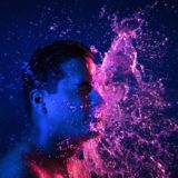 water splashing person's face