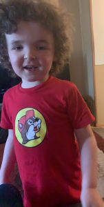 Curly haired boy with Smith-Kingsmore syndrome